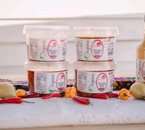 Organic Bird’s Eye Chilli Jalapeño Relish tubs with fresh chillies